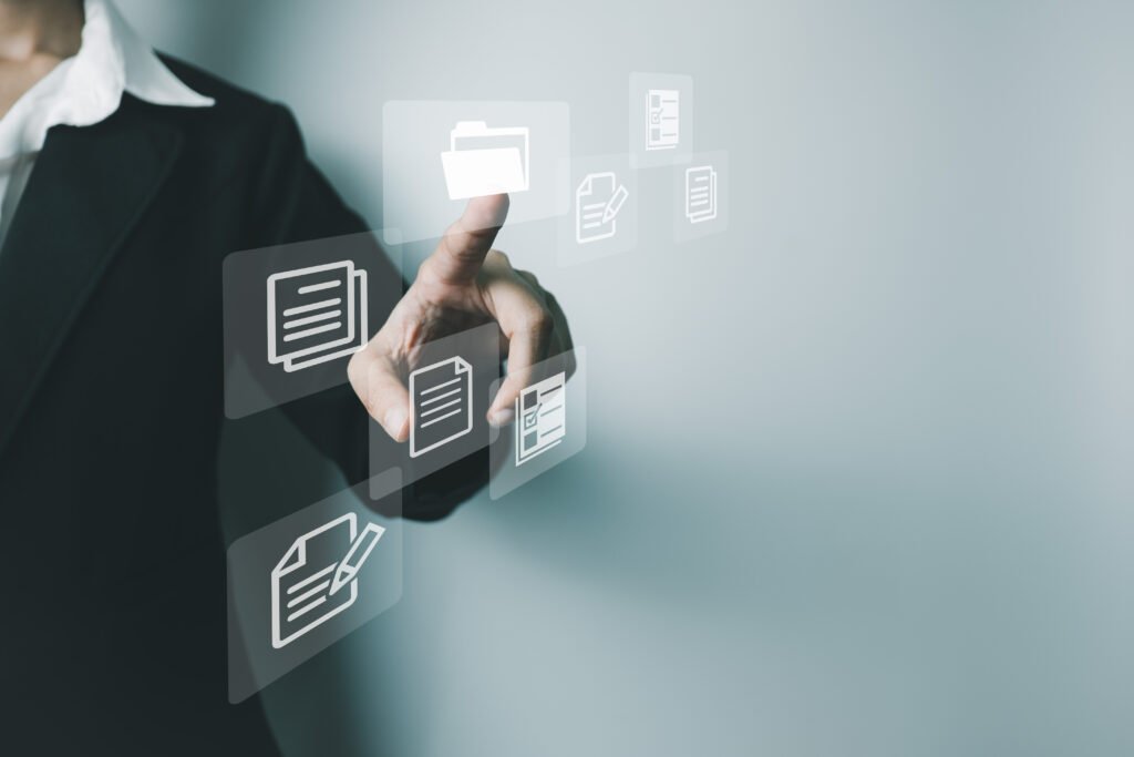 Two female colleagues in business formal collaborate with tablet